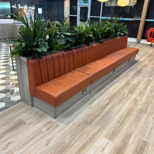 Fixed Seating With Faux Plants